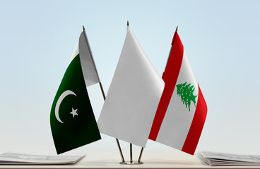 Flags of Pakistan and Lebanon with a white flag in the middle