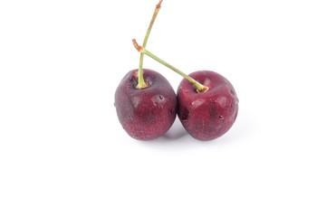 Sweet red cherries isolated on a white background.