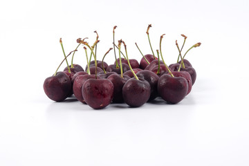 Sweet red cherries isolated on a white background.