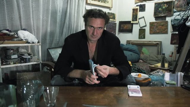 Man in the room taking money from a dangerous money lender, usury and corruption concept