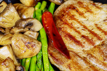 Fillet of Bordelaise with Asparagus mushrooms close up.