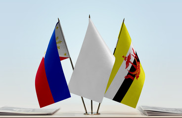 Flags of Philippines and Brunei with a white flag in the middle