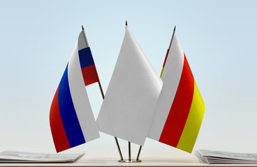 Flags of Russian Federation and South Ossetia with a white flag in the middle