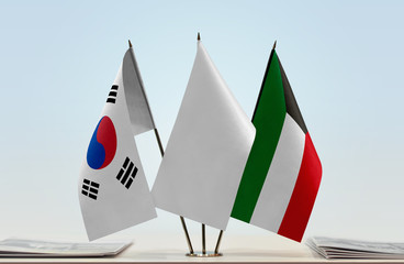Flags of  South Korea and Kuwait with a white flag in the middle