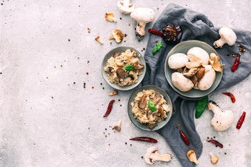 Bowl of Mushroom Risotto garnished with Thyme leaves, selective focus
