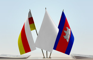 Flags of South Ossetia and Cambodia with a white flag in the middle