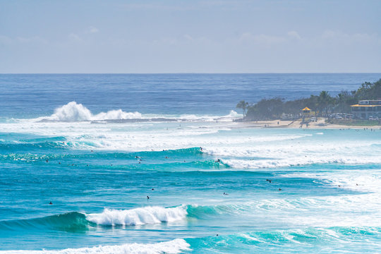 A busy day with large swell at Snapper Rocks at Coolangatta on the Gold Coast, Queensland, Australia.