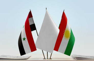 Flags of Syria and Kurdistan with a white flag in the middle