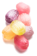 Hard candies over white background