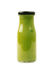 Green sauce in a bottle isolated