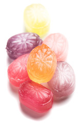 Hard candies over white background