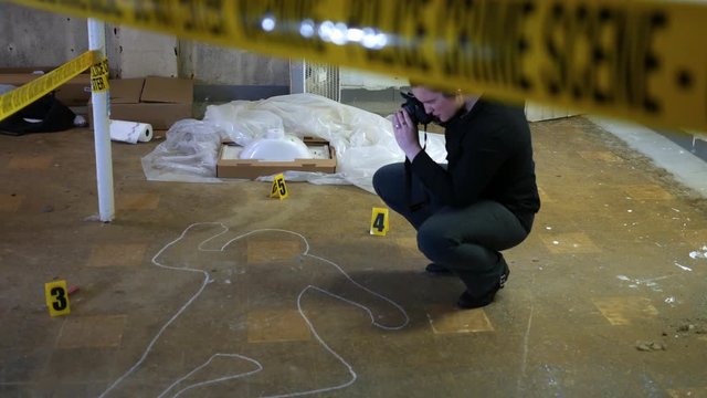 Auto Focus on a Forensic Crime Photographer at murder scene - Indie look