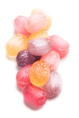 Hard candies over white background