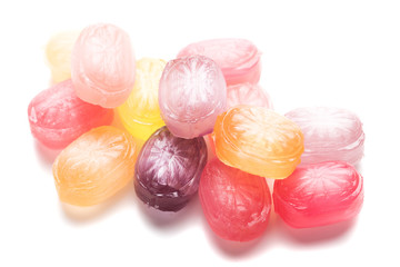 Hard candies over white background