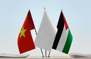 Flags of Vietnam and Palestine with a white flag in the middle