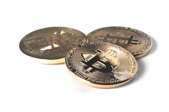 Golden bitcoin isolated on white, shallow focus