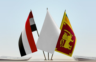 Flags of Yemen and Sri Lanka with a white flag in the middle