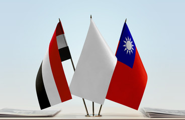 Flags of Yemen and Taiwan with a white flag in the middle