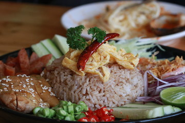 Close up rice with chili dip and codiments