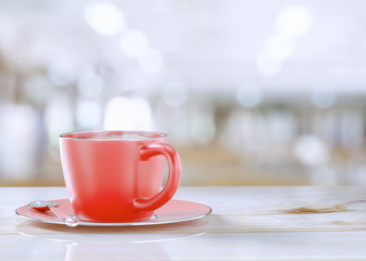 coffee red cup on abstract blurred photo background