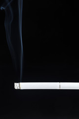 Black background cigarette smoke