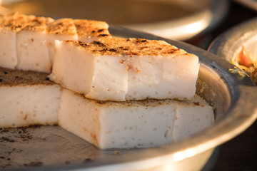 Myanmar traditional dessert divided into pieces for sale