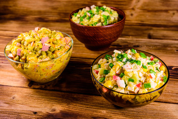 Different festive dishes on a wooden table
