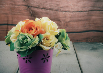 Colorful roses in a vase.