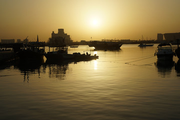 Fototapeta na wymiar Dhows on Sea in tranquil morning on sea of Doha