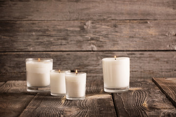 candles on old wooden background