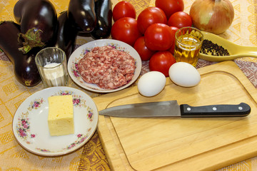 Fresh vegetables for cooking light dinner, Moussaka - a traditional Greek dish step by step cooking process
