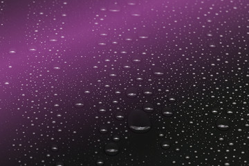 Water drops on black background