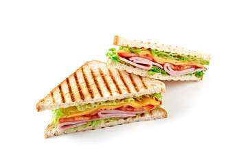 Sandwich with ham, cheese, tomatoes, lettuce, and toasted bread. Above view isolated on white background.