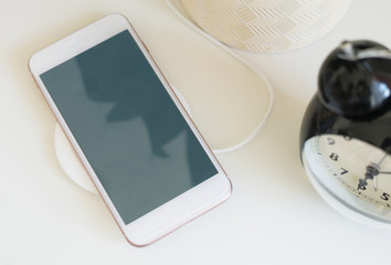 Mockup of mobile phone with wireless charger