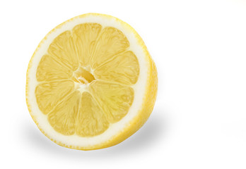 Fresh juicy lemons with halves on the white background
