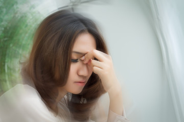 sick stressed dizzy woman suffering from vertigo, dizziness, headache