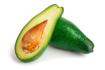 avocado and half isolated on white background close-up