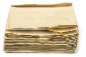 Old vintage book without cover on the white