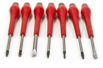 Set of pricise screwdrivers in the box on the white