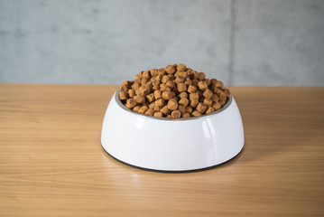 Dry dog treats in bowl