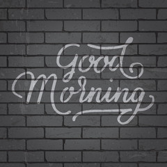 Obraz premium Hand drawn lettering slogan on brick wall background