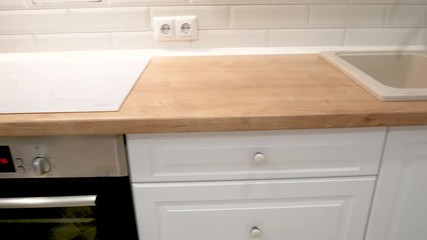 Interior view of elegant contemporary kitchen. No people.
