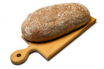 Freshly baked rye bread with a board for cutting food products isolated