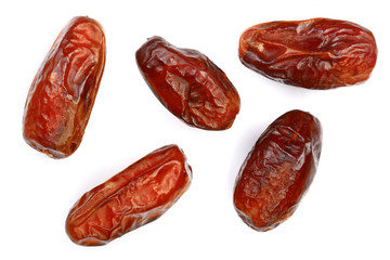 dry dates isolated on white background. Top view. Flat lay pattern