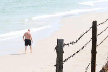 steel wire fence by the beach for security