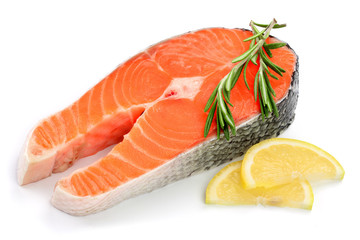 Slice of red fish salmon with lemon and rosemary isolated on white background