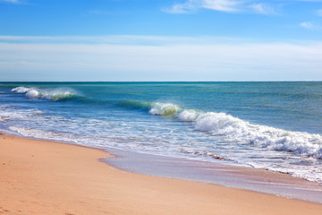Fototapeta na wymiar Beautiful seascape, wave rolling on a sandy beach, tropics, vacation, travel background