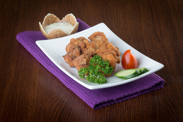japanese cuisine. fried chicken on the background