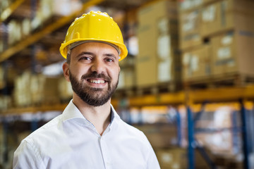 Portrait of a male warehouse worker or supervisor.