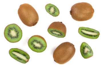 Kiwi fruit with slices isolated on white background, close-up. Top view. Flat lay pattern